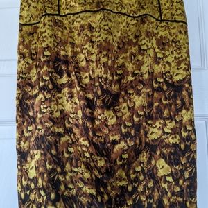 Gently used Marciano pencil skirt in stretch satin. Size 6.